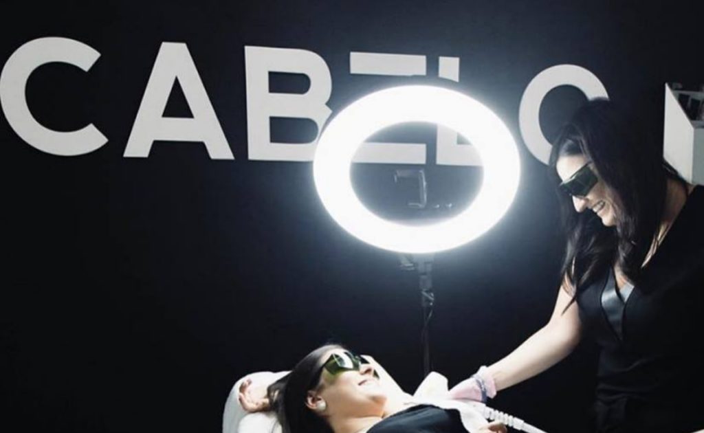 business owner and client during treatment in house salon black background cabelo logo blog header image
